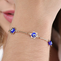 Pulseira olho grego com flor | Banhado a Ouro 18k